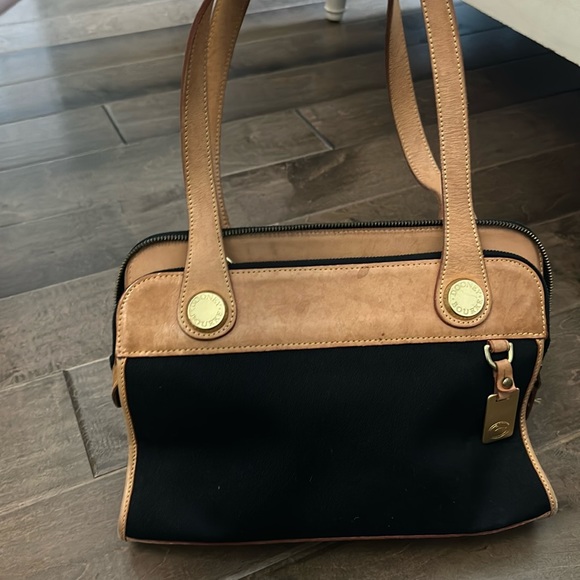 Dooney & Bourke Handbags - Vintage Dooney  and Bourke Cabriolet leather and black canvas shoulder bag